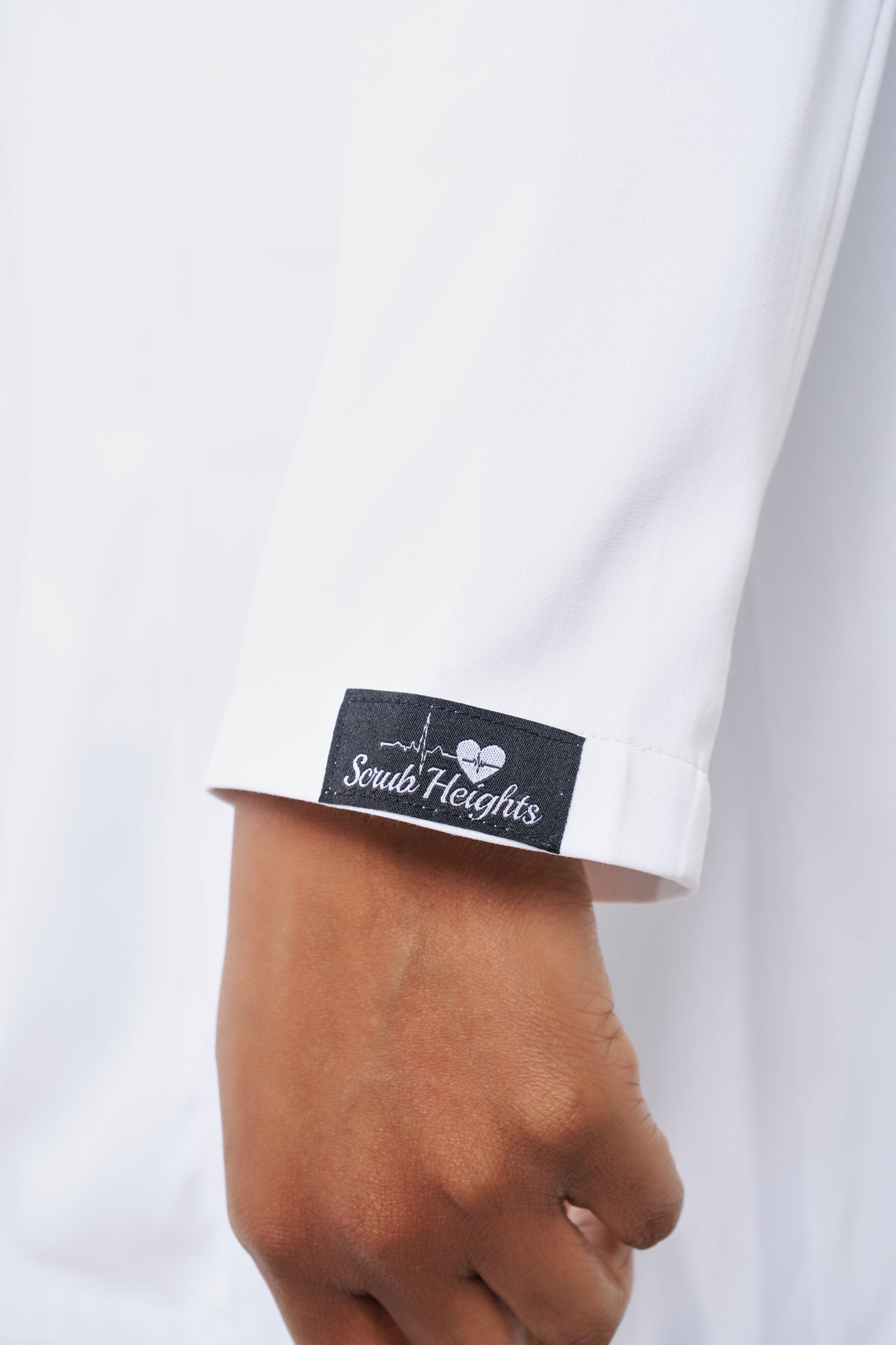 Custom white lab coat with metal snaps